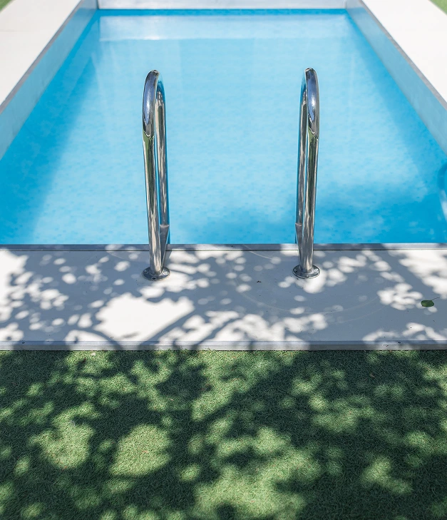 clean pool edge with rails