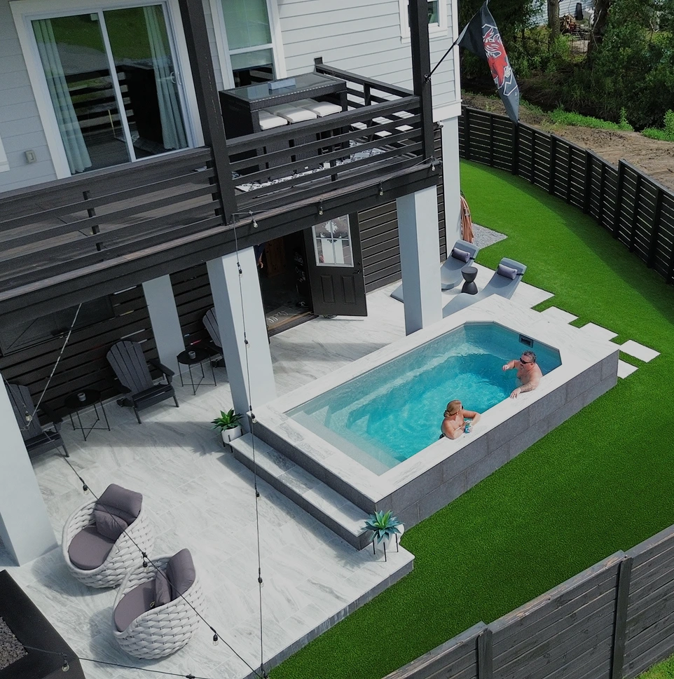 long shot of a couple in the pool