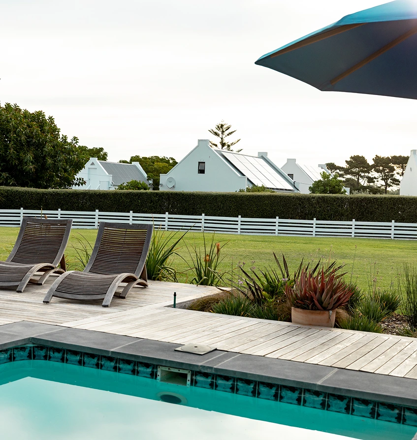 outdoor deck with pool chairs