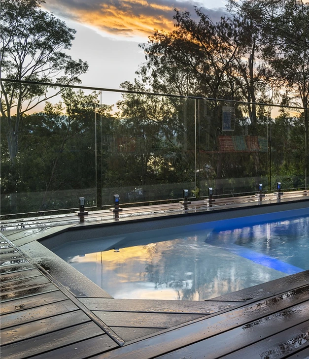 pool deck with sunset sky